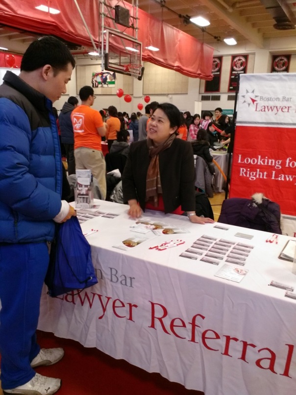 Attorney Mary Lee (Mary K.Y. Lee P.C.) speaks to an attendee about the BBA LRS, the only lawyer referral service in greater Boston approved by the American Bar Association. 